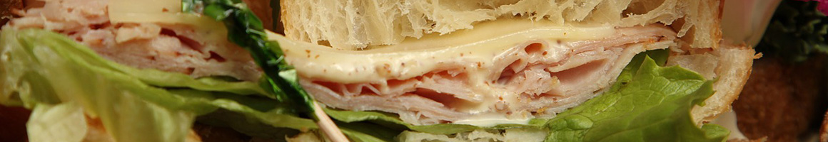 Eating Sandwich at University Hero restaurant in Corvallis, OR.